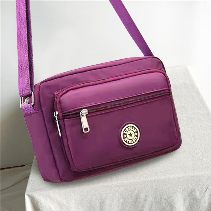 2024 nylon cloth middle-aged and elderly mother flower cloth bag shoulder slung large capacity mobile phone bag factory supply postage