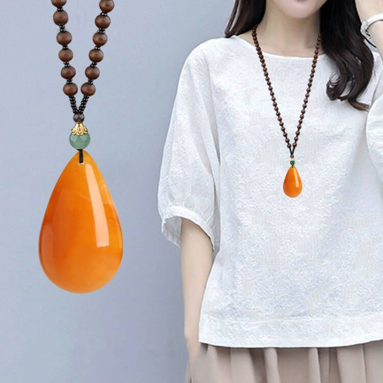 Old beeswax water drop necklace Amber long sweater chain peace buckle Peony Flower vintage men's and women's chicken oil yellow pendant