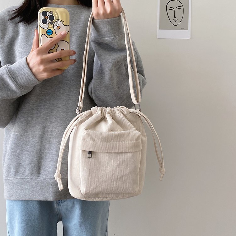 2023 Summer new medium stitching drawstring shoulder bag corduroy foreign trade trend bucket bag