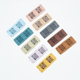 Spot color sewing label madewithlove letters with holes folded decorative water washing label 5x2cm