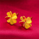 A pair of #3 stud earrings with earplugs