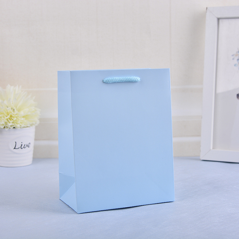 Custom white card monochrome shopping bag printed clothing accessories packaging bag wholesale takeaway packaging advertising tote bag