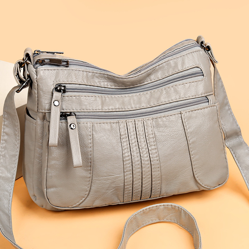 Women's bag 2023 new fashion simple shoulder bag soft leather multi-pocket messenger bag middle-aged women's mother bag