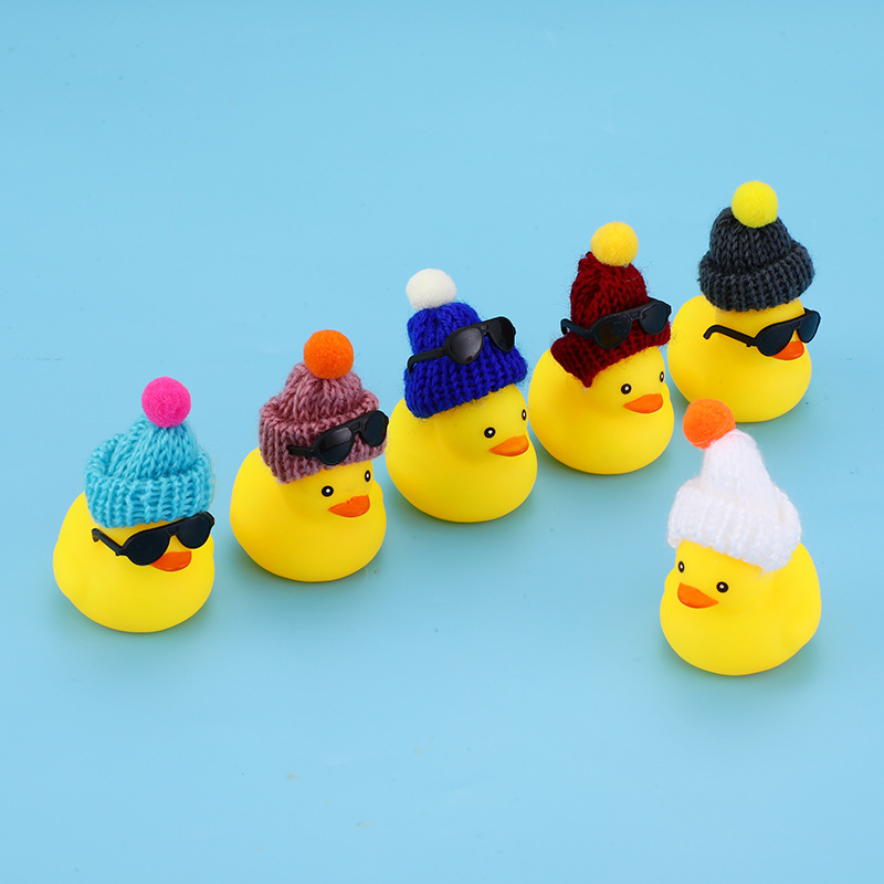 Little Yellow Duck playing water bath toy hat little duck hand playing lemon tea sunglasses vinyl doll duck