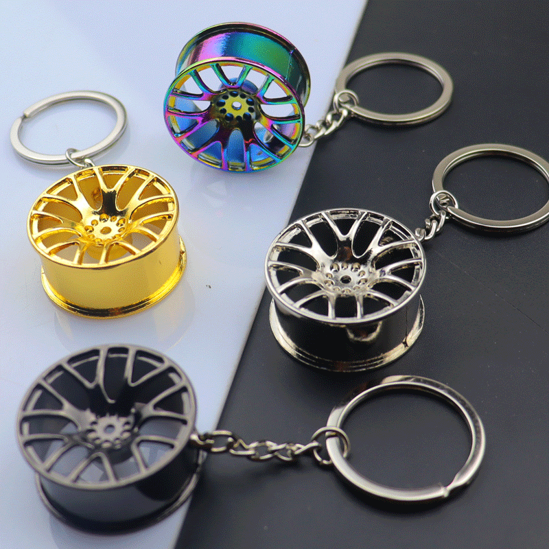 工場の優良品質の亜鉛合金のキーホルダーのアイデアの自動車のハブのキーホルダーのペンダントの贈り物の工芸品はlogoを印刷することができます。|undefined