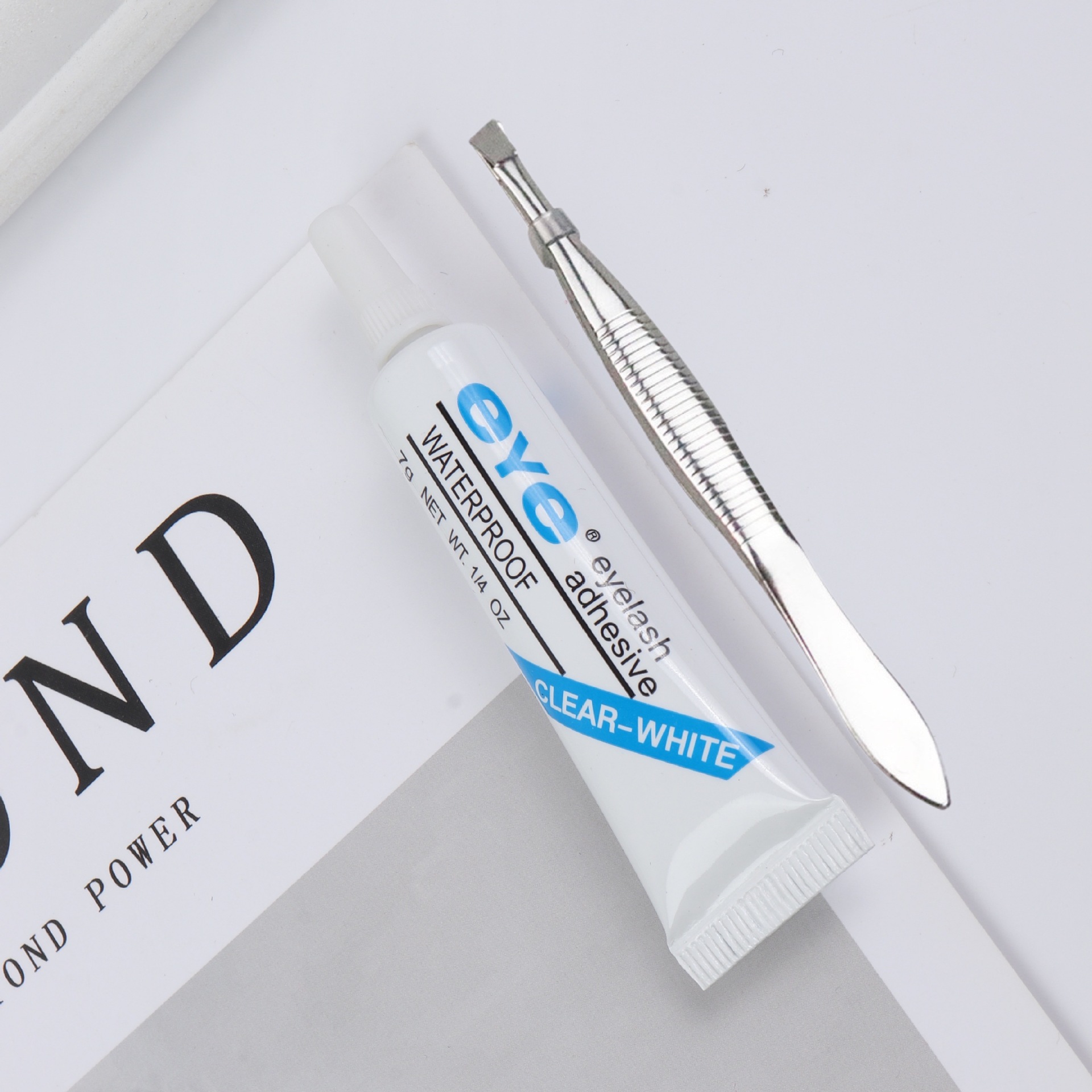 Factory wholesale eye false eyelash glue 7g plus tweezers two-piece seamless quick-drying disposable false eyelash glue