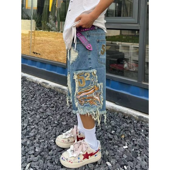 European and American street fashion hip hop men and women couple ins fashion brand ripped Embroidered Tassel High Street Denim shorts