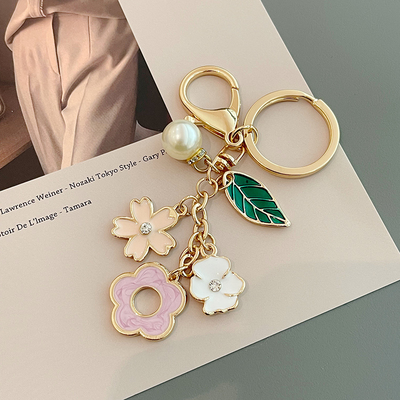 Korean style new style fresh cherry blossom keychain pendant metal Pearl Flower key chain girls' bag ornaments