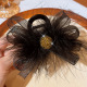 Golden diamond ball feather grip clip
