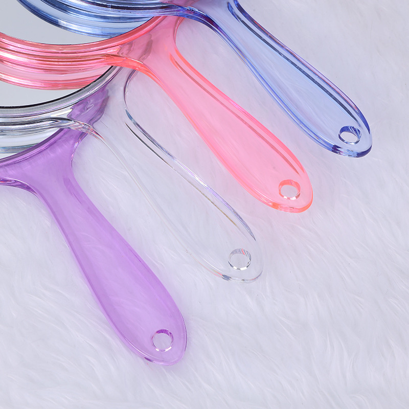 Wholesale girls' dormitory simple makeup mirror carry-on mini dressing mirror round glass single-sided handle mirror