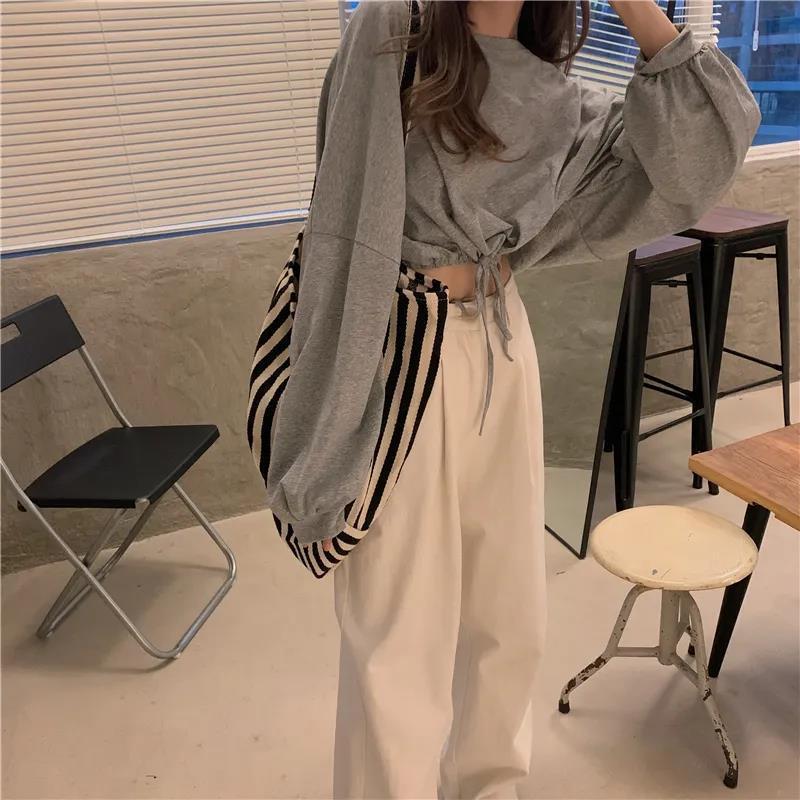 Spring Korean style loose high-waisted short long-sleeved white tops women's T-shirts student trendy ins navel-baring autumn clothes for outer wear