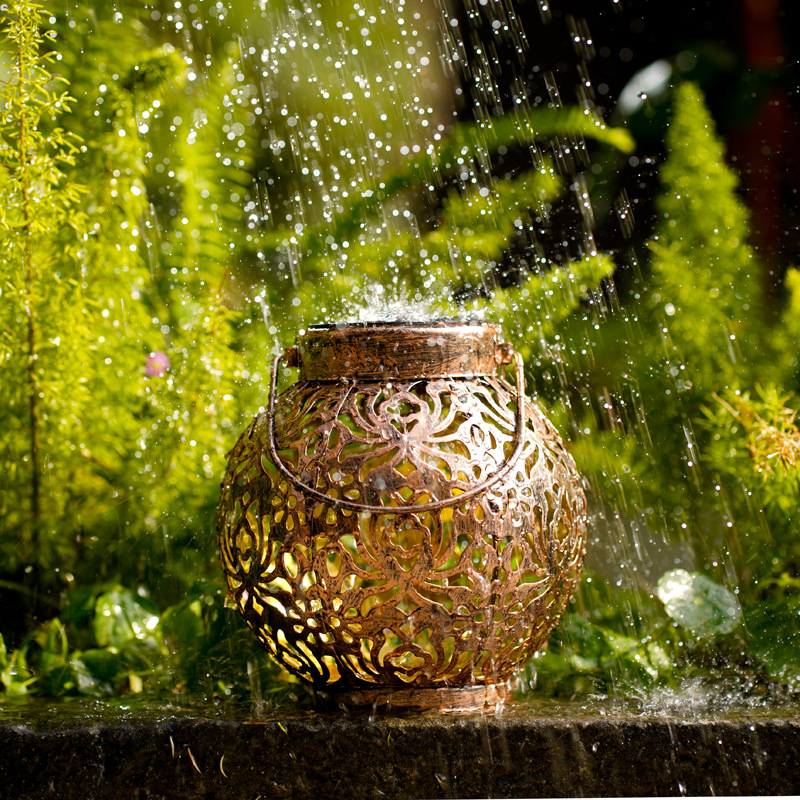 Cross-border iron hollow solar lamp outdoor garden garden layout lamp peony projection lamp portable hanging lantern