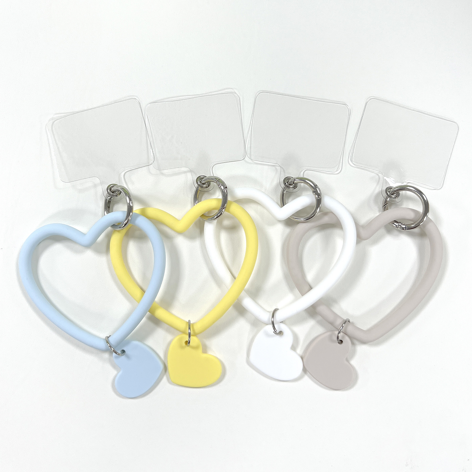 E-Commerce explosions mobile phone keychain solid color silicone anti-lost key ring bracelet heart-shaped mobile phone lanyard factory wholesale