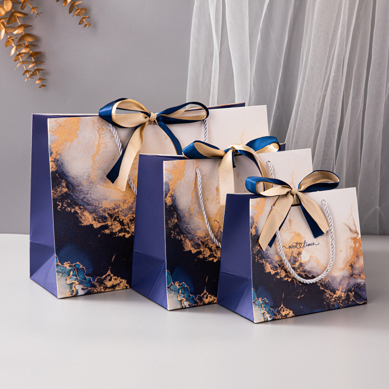 In stock sapphire blue marbling high-grade gift bag ribbon handbag cross-border color printing packaging bag foreign trade paper bag