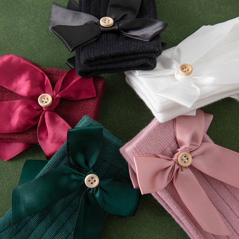 Girls' big bow long baby socks autumn and winter New pure color combed cotton baby socks children's socks wholesale