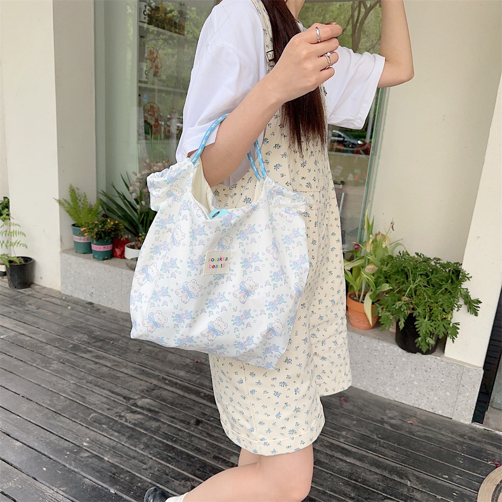 Korean embossed cartoon canvas bag for women large capacity handbag for shopping, work and commuting bag