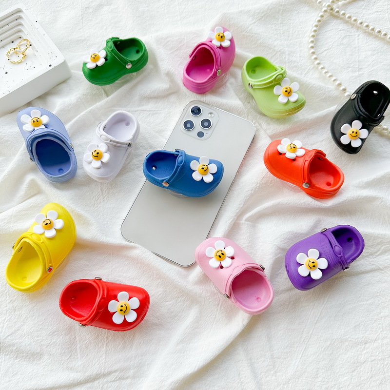 Simulation hole shoes mobile phone airbag bracket flower smiley face small slippers adhesive retractable fresh ins style