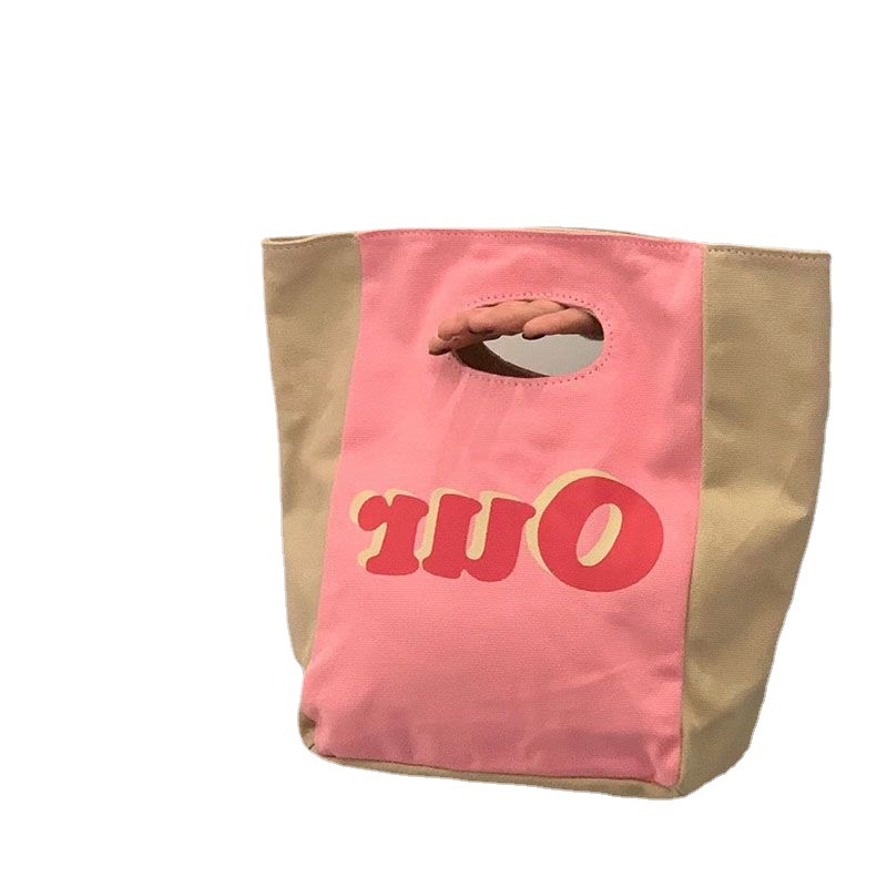 A generation of small design cute hand bag tote bag leisure commuter lunch box bag cosmetic bag storage bag women