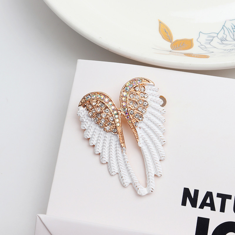 European and American new oil dripping diamond angel wings brooch corsage White trendy fashion clothing accessories pin