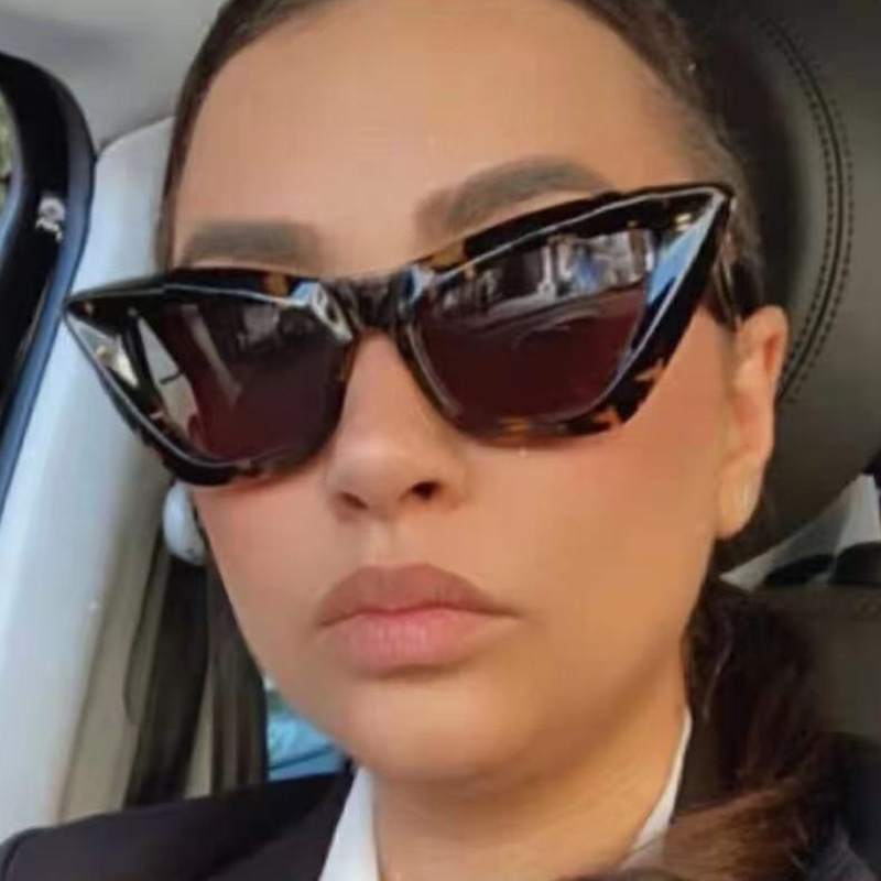時尚歐美太陽鏡透明雙色貓眼女百搭墨鏡跨境潮流米釘太陽鏡
