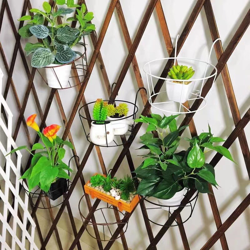 Factory direct balcony flower rack wrought iron hanging flower pot rack railing green flower rack indoor storage rack