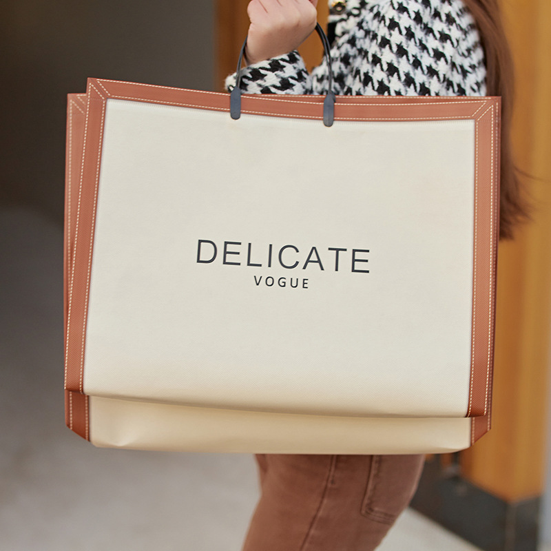 Spot coated non-woven bag portable clothing store bag shopping bag shopping bag fashion women's bag customization