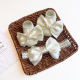 (Beige) ribbon bow