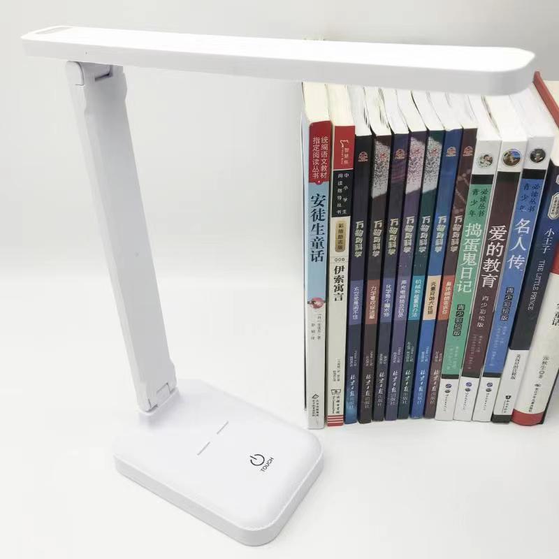New USB rechargeable eye protection multifunctional folding book lamp creative desk lamp simple bedroom reading book lamp stall photo