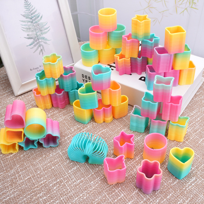 Kindergarten hot toys 35mm mini rainbow ring stall selling children's stacking ring manufacturers wholesale spring ring