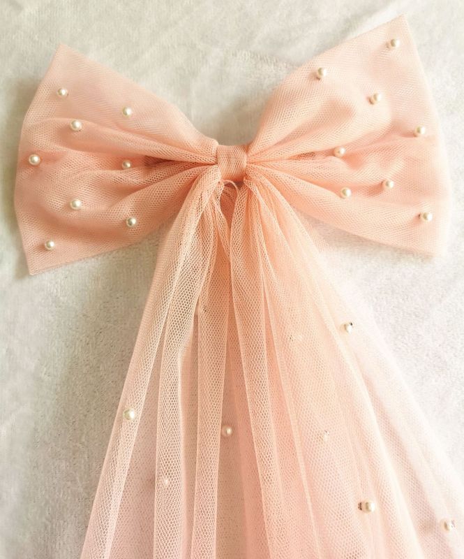 新商品の網紅チャオ仙網紗は真珠の蝶結びの結婚式のウェディングドレスの気質の少女のトップクリップの髪飾りを持っています。|undefined