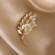 Cat's Eye Stone Wheat Ear High-end Brooch Women's Design Sense Niche Luxury Internet Popular Anti-glare Corsage Pin Buckle Accessories