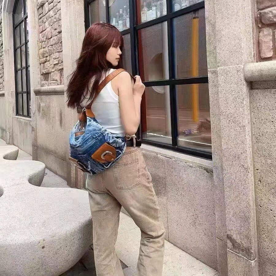 伊妮兒機車牛仔包女小眾設計感學生通勤休閒雙肩包復古百搭斜挎包