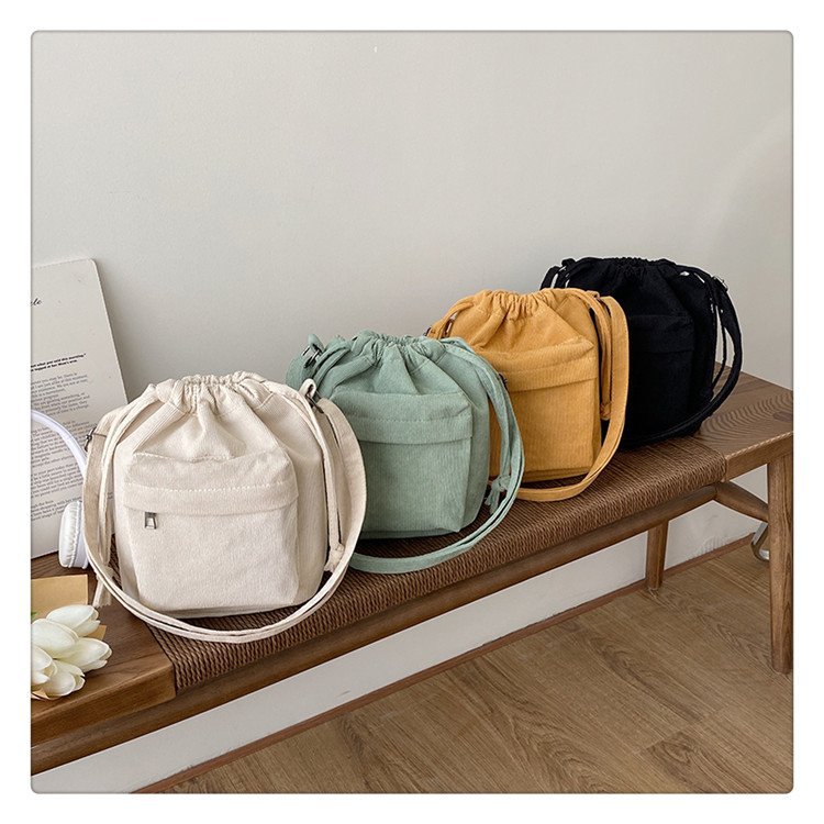 2023 Summer new medium stitching drawstring shoulder bag corduroy foreign trade trend bucket bag