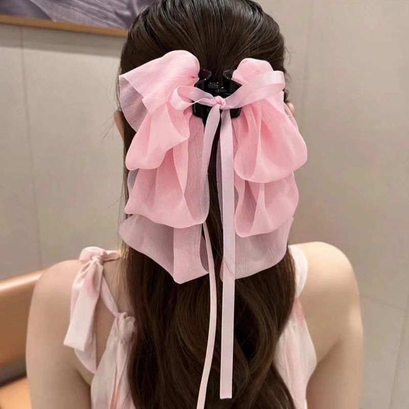 フランス式の優しさは顔が小さくて、髪の量が女性のシフォンの糸を巻いて、シフォンのサメのクリップの頭飾りを持っています。|undefined