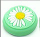 Daisy on green background