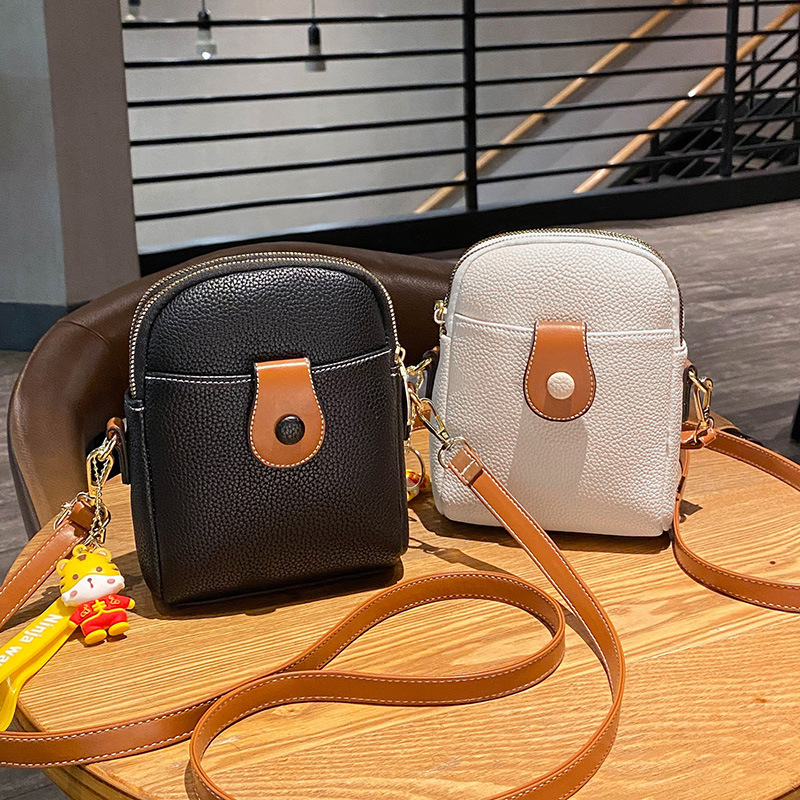 Factory store women's handbags mobile phone mini bags 2023 New Fashion shoulder messenger bag women a generation of hair