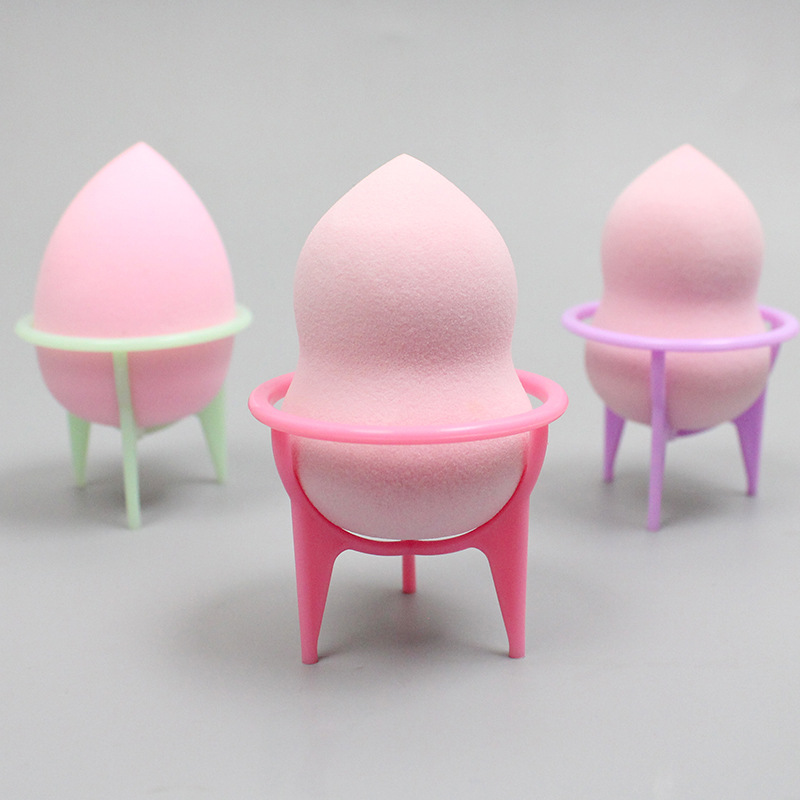 Beauty egg storage bracket tripod plastic shelf makeup sponge egg bracket powder puff face washing puff drying rack wholesale
