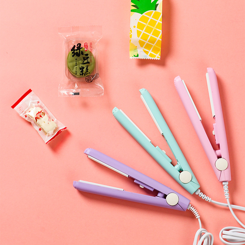 New Portable Mini Food Household Small Heat Sealing Machine Plastic Packaging Bag Hand Pressure Snack Bag Sealing Machine