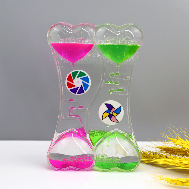 Two-color oil spill toy dynamic decompression oil drop hourglass Crafts desk ornaments student gifts graduate children