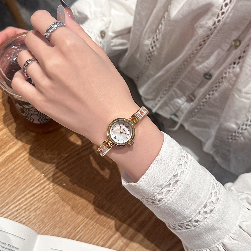 Time and Space Corridor New Entry Light Luxury Rhinestone Elegant Bracelet Watch Niche Simple Fashion Casual Women's Quartz Steel Band Watch