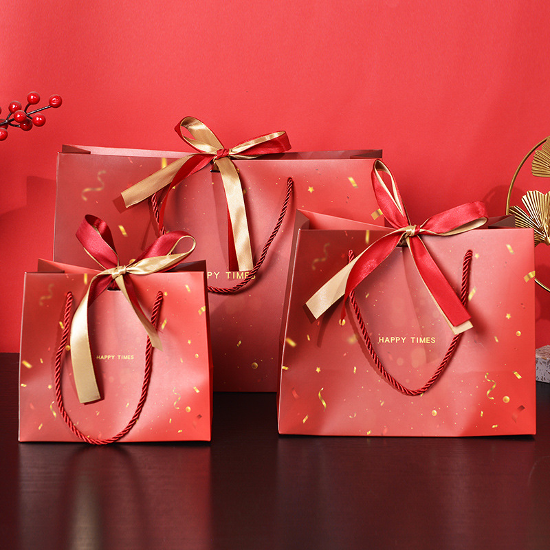 Red festive red gift bag candy packaging bag gift bag New Year gift bag universal paper bag handbag ribbon