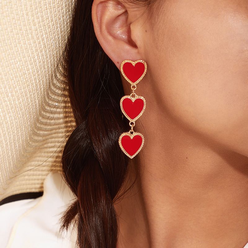 Cross-Border fashion foreign trade new elegant dripping red Love earrings simple European and American Peach heart tassel earrings