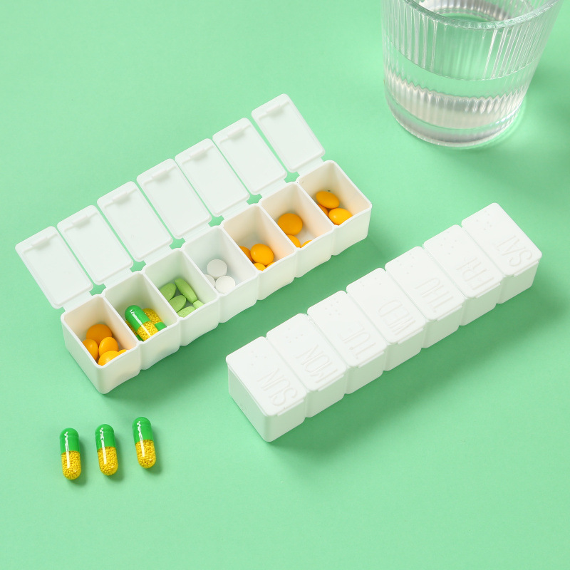 Wholesale week medicine box strip type 7 days a week medicine box 7 compartment sub-packing medicine box convenient advertising storage box in stock