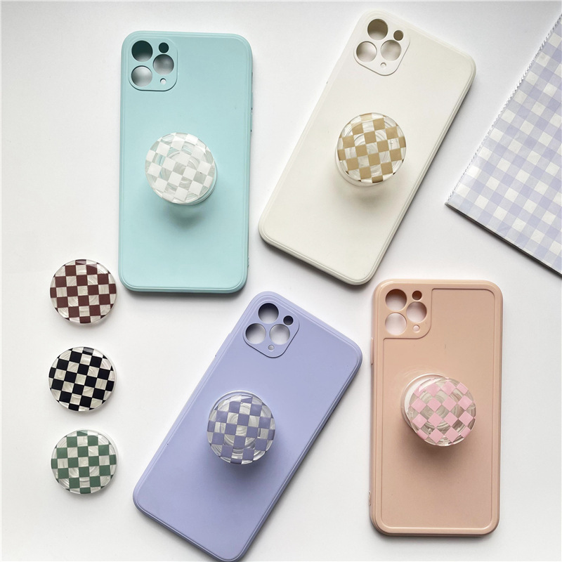 Cross-border foreign trade chessboard glue drop solid color transparent airbag bracket lazy retractable desktop mobile phone bracket DIY