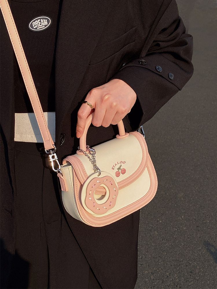 2023 new bag cute junior high school student saddle bag Japanese biscuit creamy-white portable shoulder messenger bag female spring