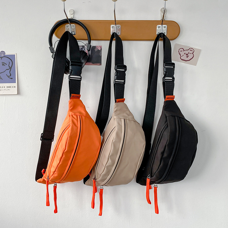 Factory wholesale waist bag men's ins fashion Japanese casual messenger bag men's and women's sports phone bag large capacity chest bag