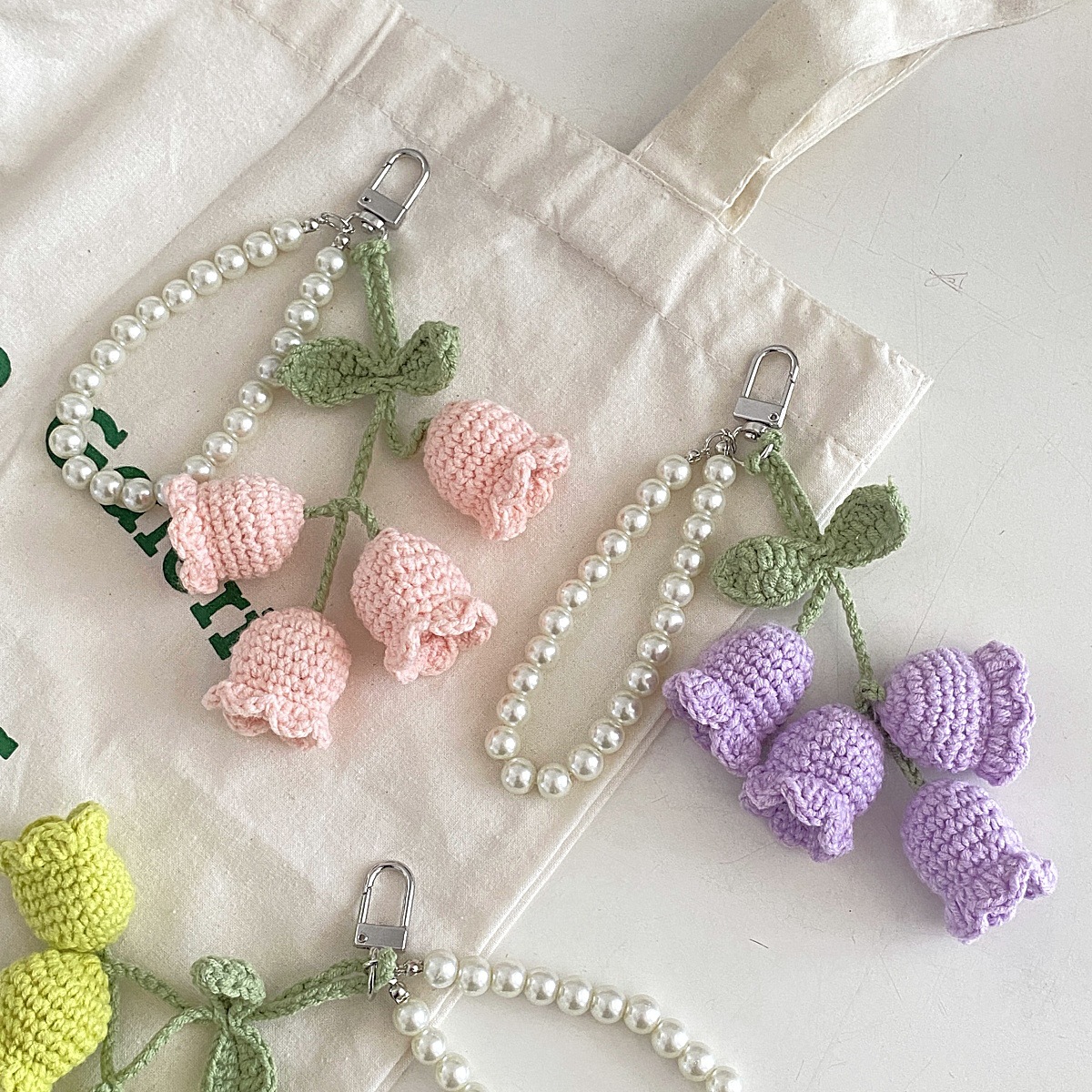 ins Korean style creative cute girl Pearl chain wool crocheted Lanling flower string keychain bag decorative buckle