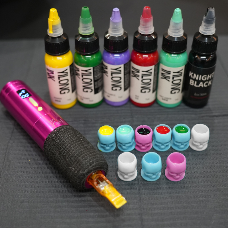 Yilong tattoo equipment cross-border new skull tattoo color cup 200/bag with base pattern