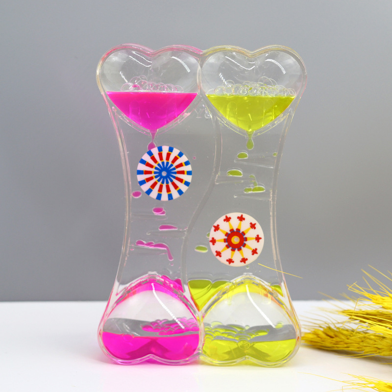 Two-color oil spill toy dynamic decompression oil drop hourglass Crafts desk ornaments student gifts graduate children