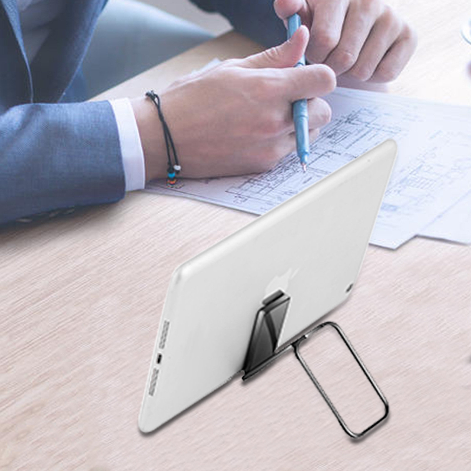 Portable mobile phone bracket metal folding rotatable live paste desktop navigation car mobile phone bracket wholesale
